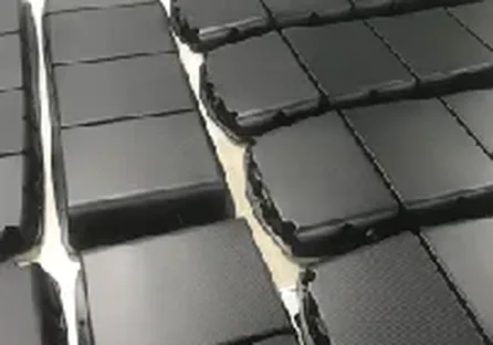 Stacked carbon fiber plates after cure