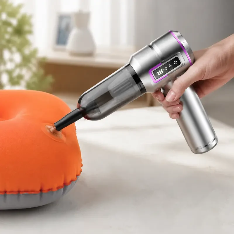SHINETECH car vacuum cleaner inflating an orange travel pillow