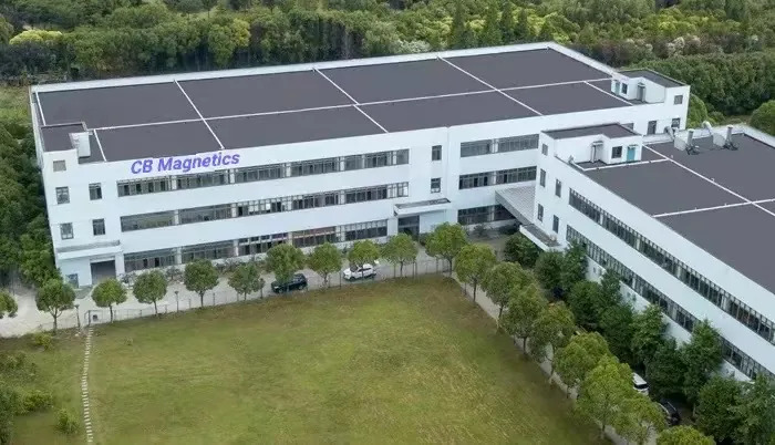 The plant, with the company name on the building.