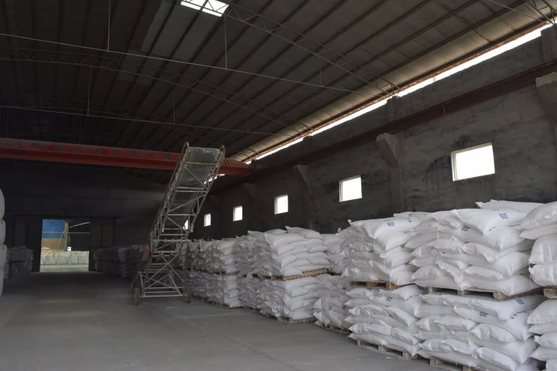Palletised 50 kg bags stored in the warehouse