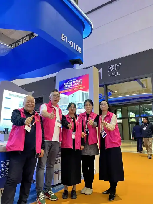 Our export sales team meeting buyers at a seafood trade show
