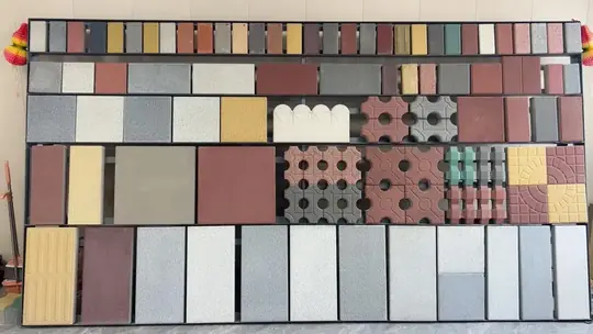 Wall of concrete block and paver samples showing the shapes the machines produce