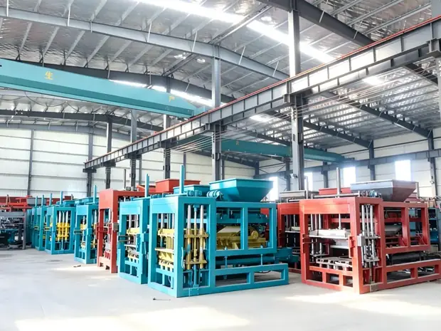 Painted block machine frames inside the BRICKMATE production hall