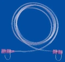 Coiled clear plastic medical tubing with end connectors on a blue background
