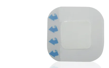 Square transparent adhesive medical dressing with blue peel tabs