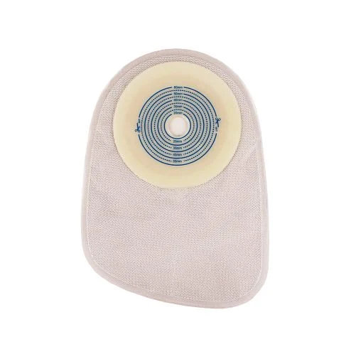Medical ostomy pouch with cut-to-fit circular adhesive barrier on a white background