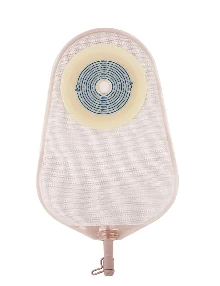 Single-piece medical ostomy drainage bag with measuring guide on adhesive wafer