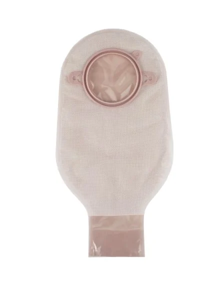 Beige drainable ostomy pouch with circular coupling ring on a white background