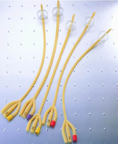 Five yellow three-way Foley catheters with inflated retention balloons