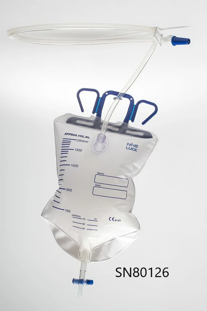 Medical drainage bag with tubing and blue hanger on white background
