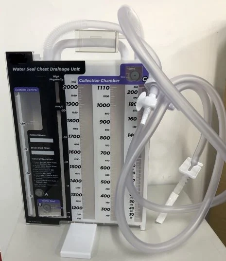 Medical water seal chest drainage unit with collection chamber and attached flexible tubing