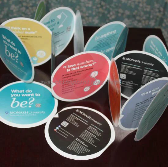 Accordion fold brochure closed showing round front panel