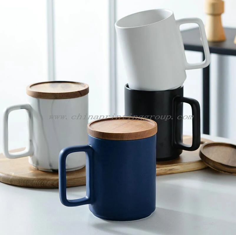 Set of branded mugs in different colours with wooden lids