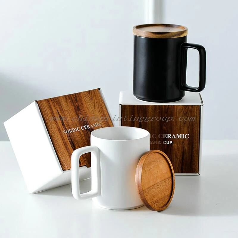 Green matte porcelain mug with wooden lid beside coffee beans