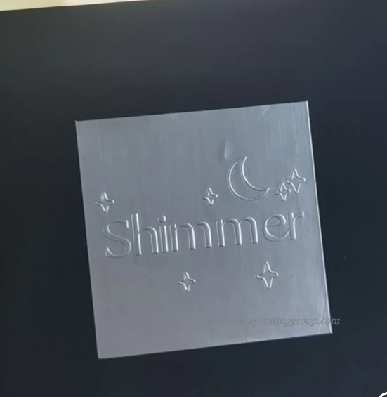 Debossed logo sealing label for packaging