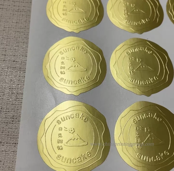 Blind embossed business logo stickers on paper
