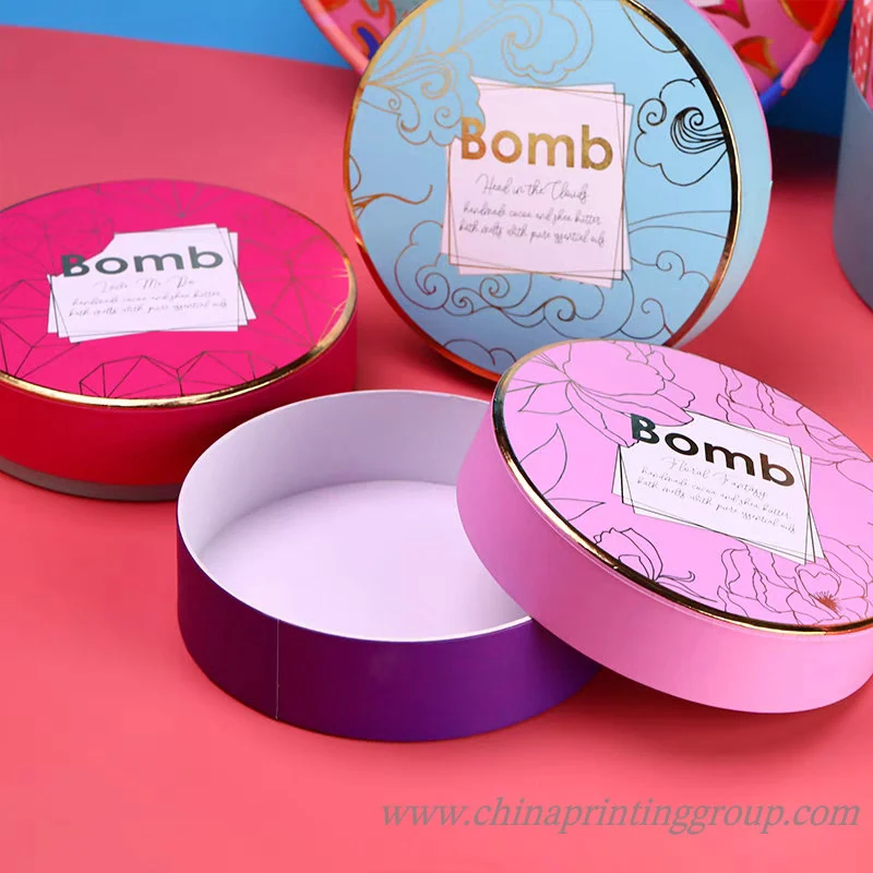 Round cardboard gift tube with a fitted paper lid