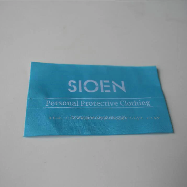 Woven garment neck label sewn into a shirt collar