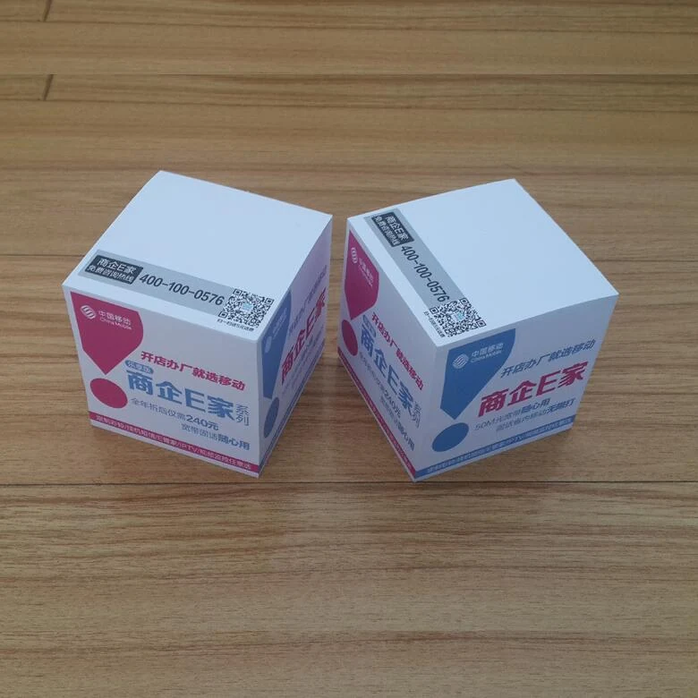 Cube notepad with hardcover holder on an office desk