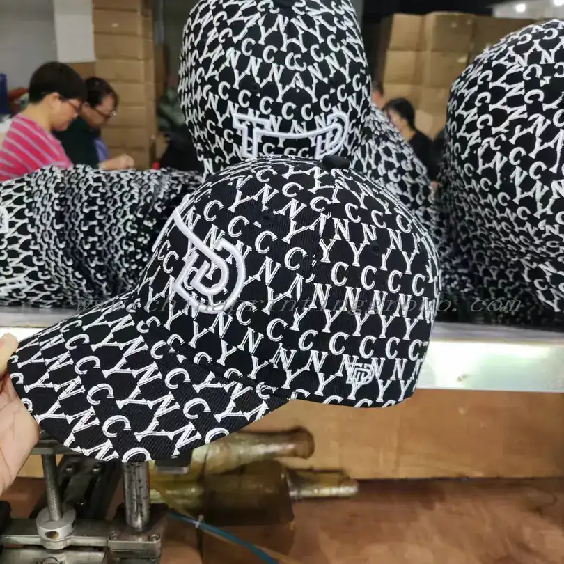 Close view of 3D embroidery stitch detail on a cotton cap