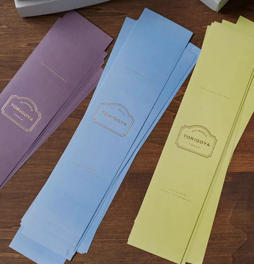 Gift box with gold foil stamped belly band sleeve