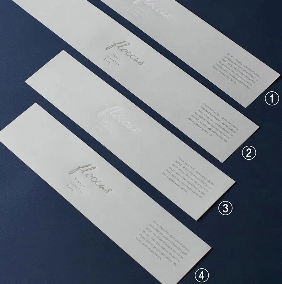 Several belly band sleeve designs shown side by side on boxes