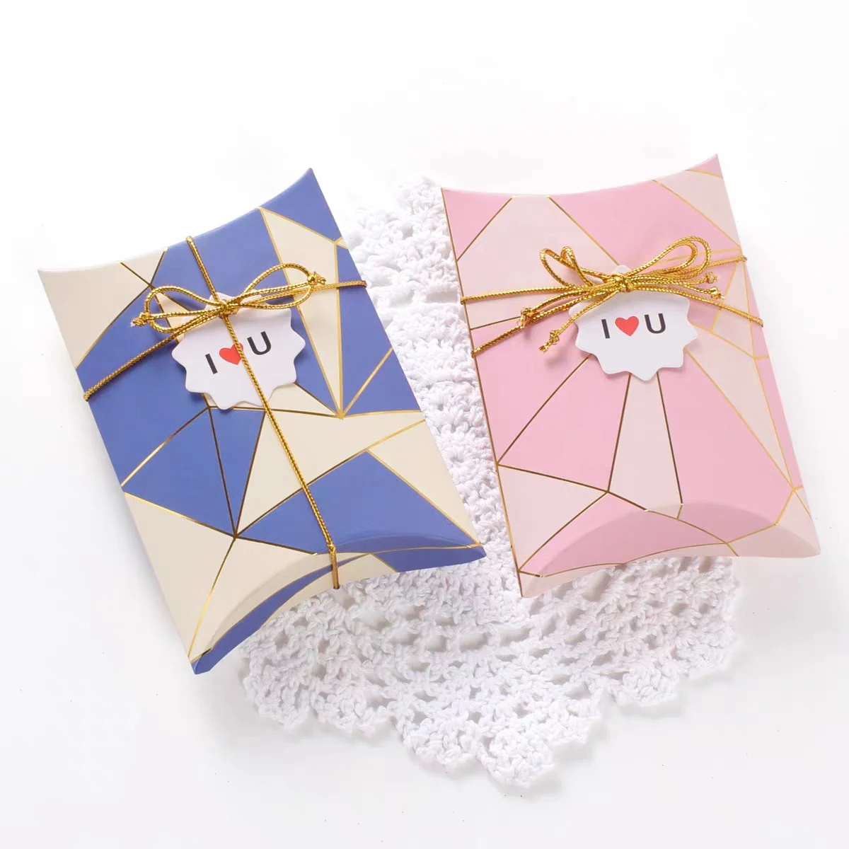 Stack of custom printed pillow boxes packed for shipping