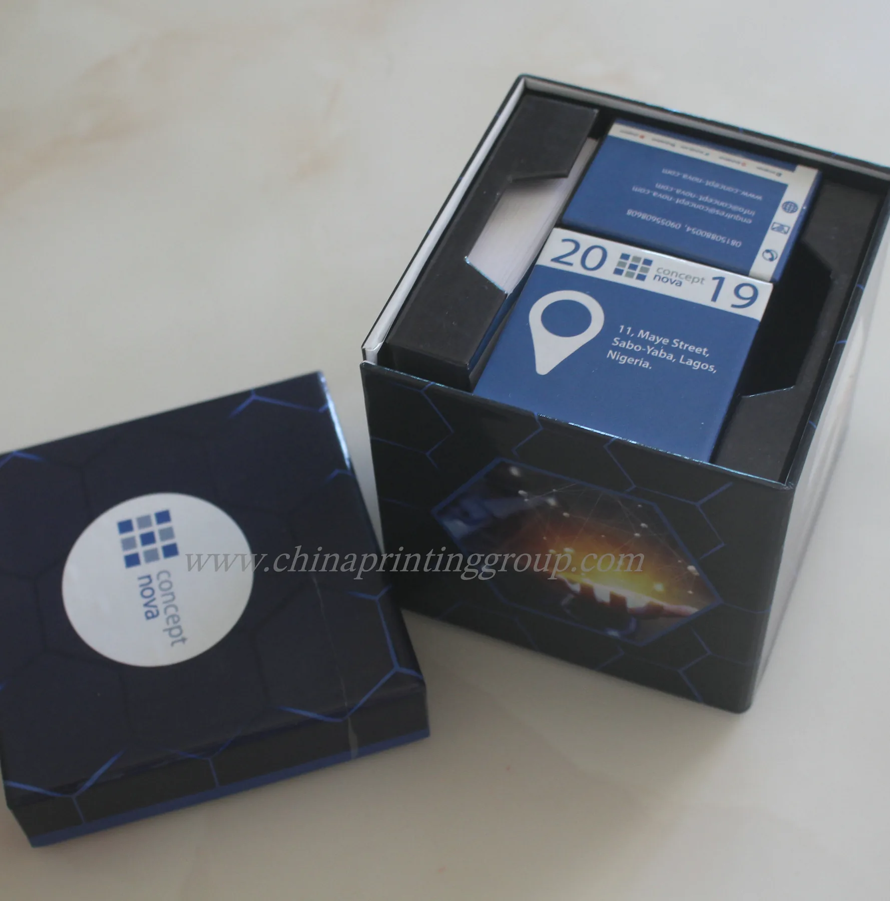 Cardboard calendar notepad box shown closed with printed branding