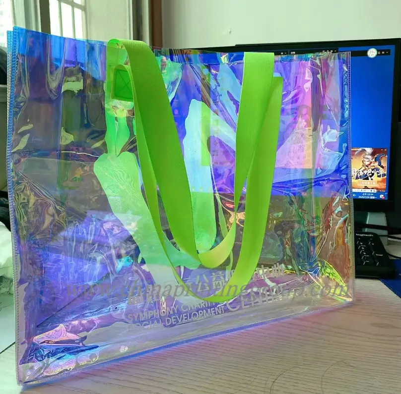 Transparent PVC tote bag with inner pocket and button closure