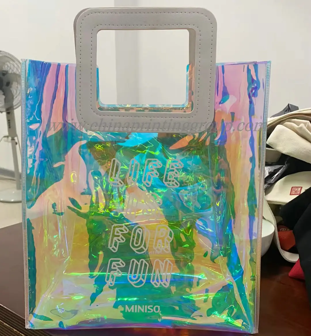 Waterproof PVC shopping bag shown with handles and zipper