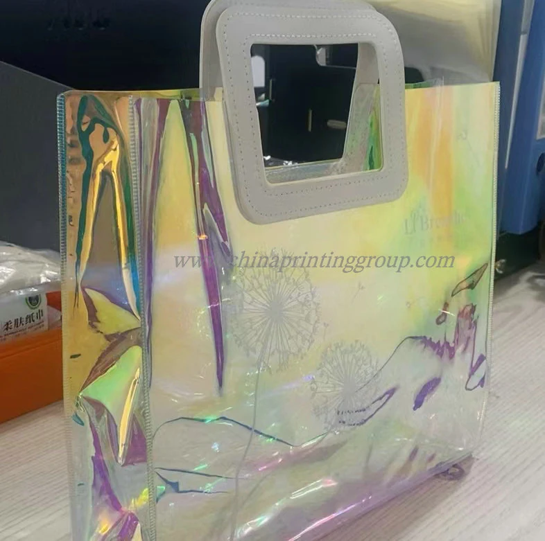 Group of clear and holographic PVC tote bags in different sizes