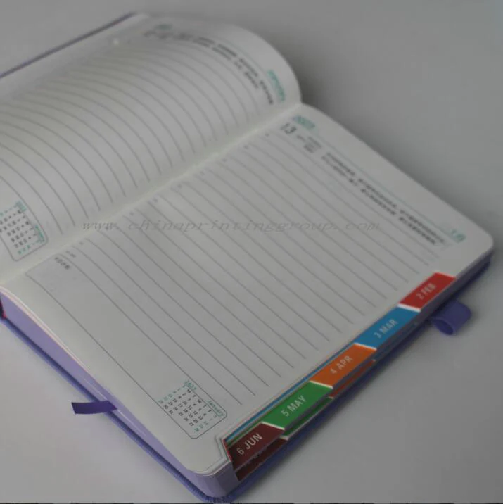 Personalised PU leather journals in several cover colours side by side