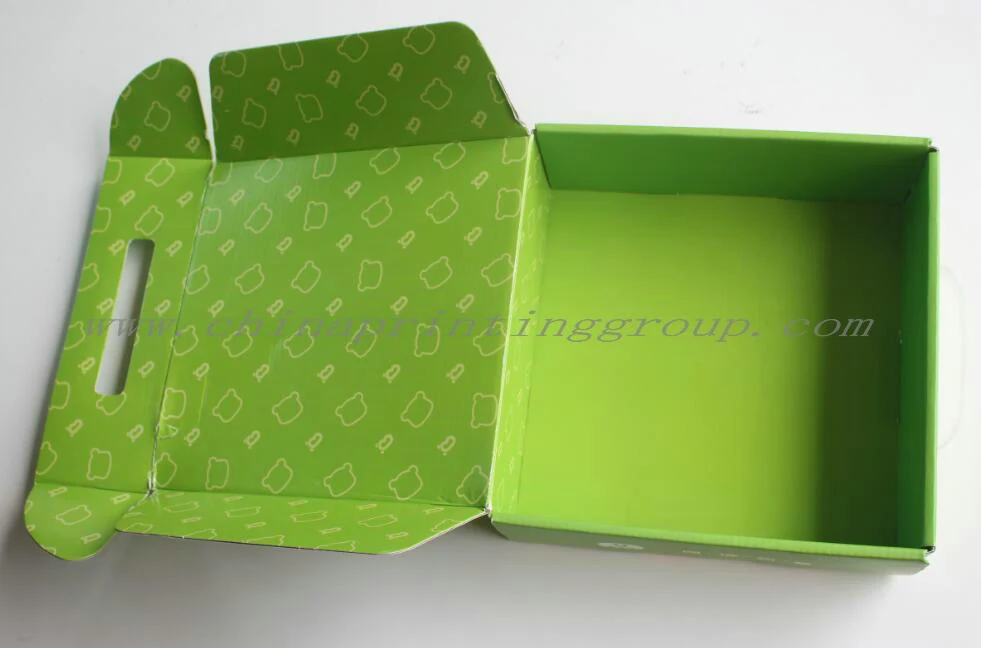 Printed corrugated mailer boxes stacked flat before assembly