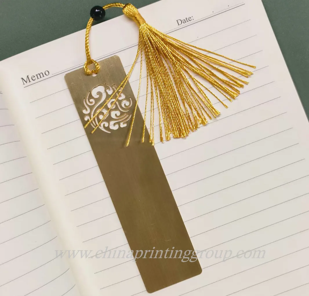 Set of personalised metal bookmarks in assorted shapes