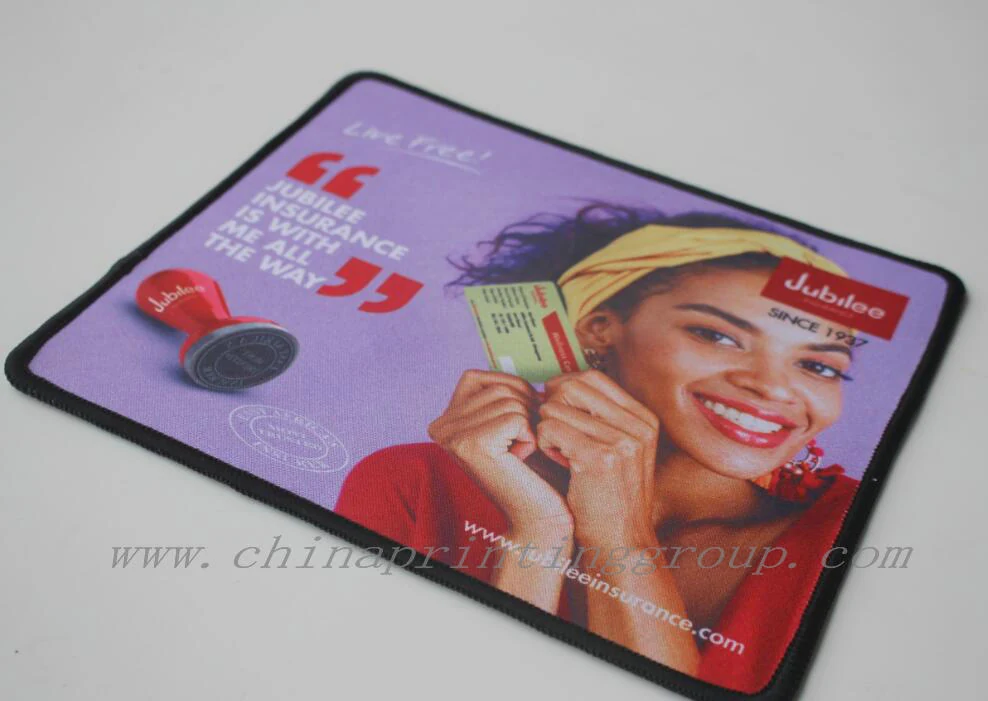 Custom mouse pad in use on a desk with keyboard and mouse