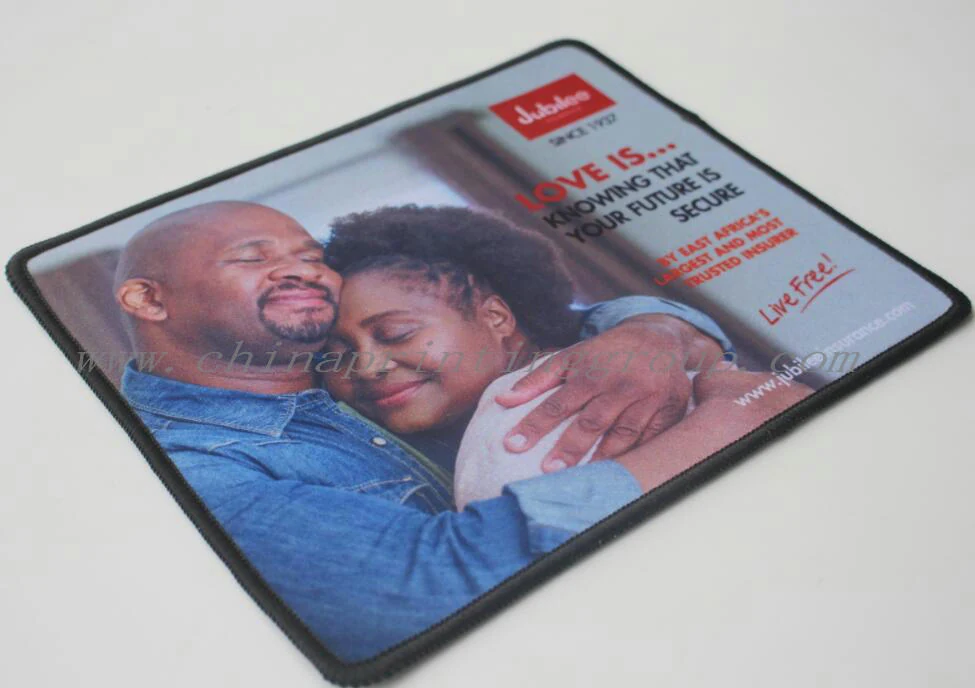Stack of promotional mouse pads in different printed designs