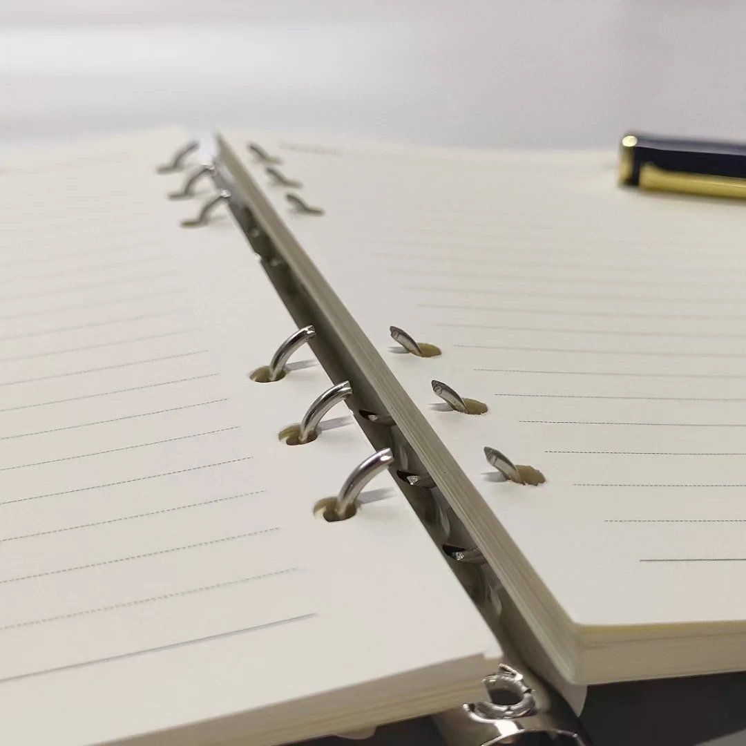 Close view of spiral binding coil on an A5 custom diary