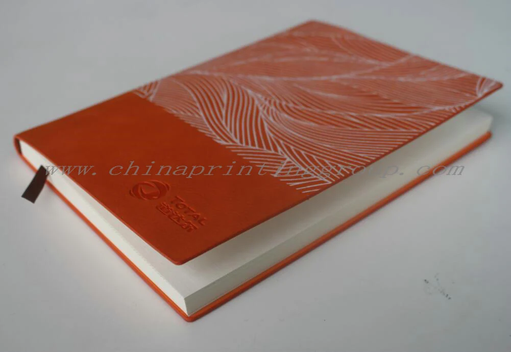 Hardcover custom notebooks stacked showing spiral spines