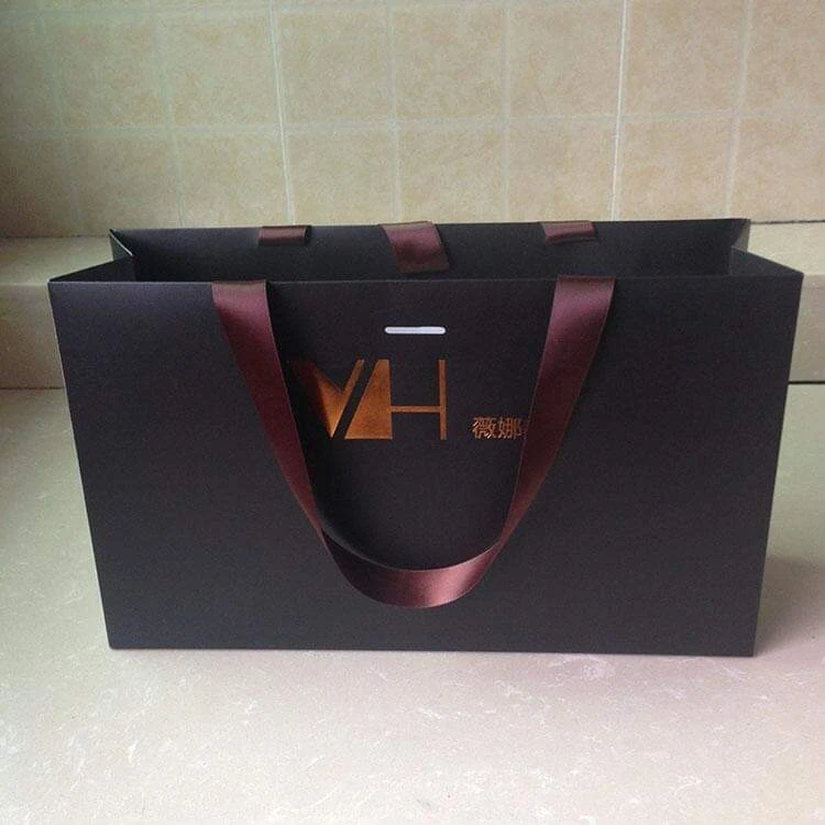 Custom printed luxury paper bags arranged for retail display