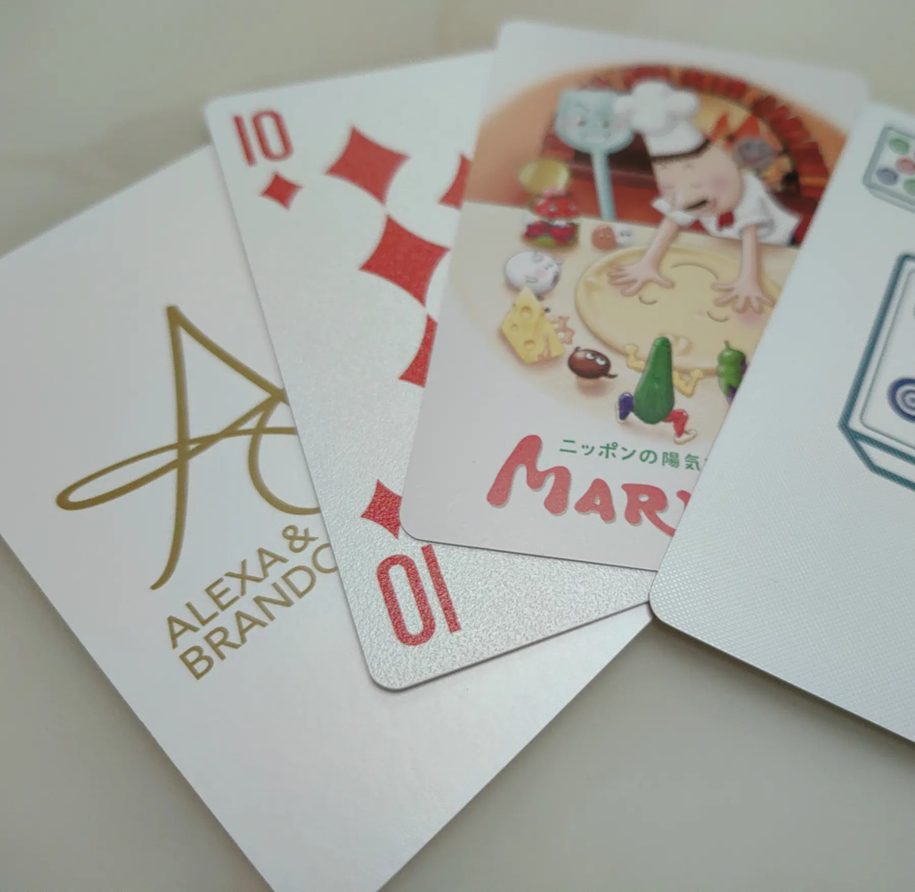 Shrink wrapped custom playing card decks ready for packing