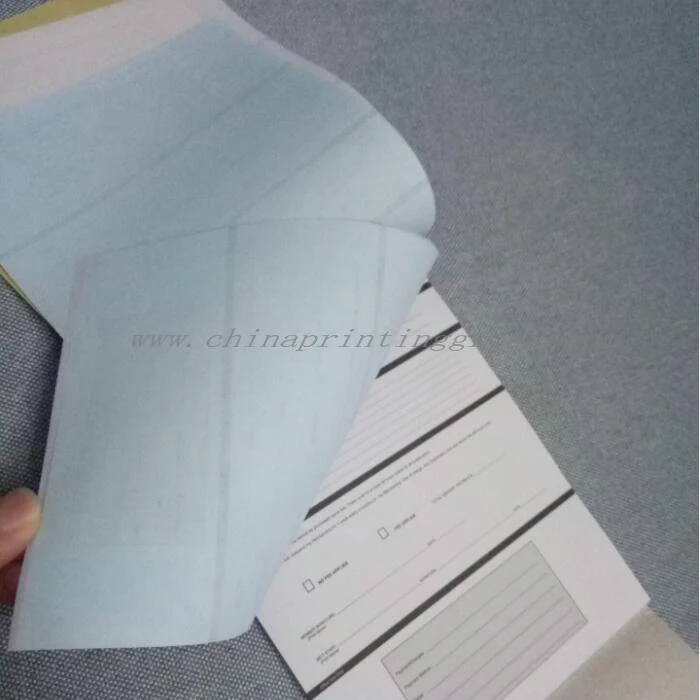 Receipt book opened showing white and pink carbonless copies