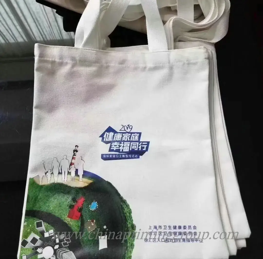 Natural cotton shopping bags stacked before packing
