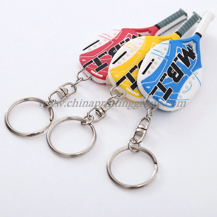 Soft PVC keychains showing embossed logo detail