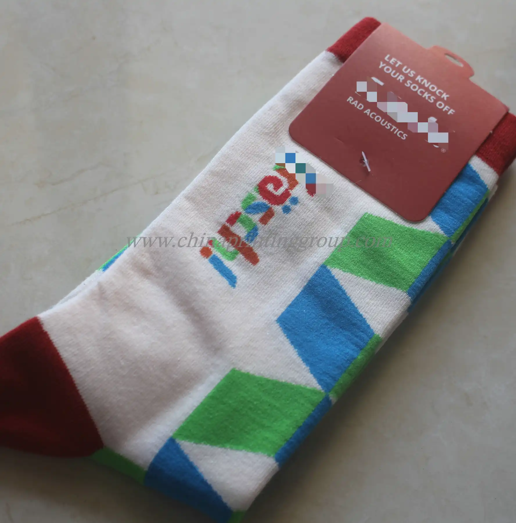 Custom athletic crew socks with knitted brand logo on the cuff
