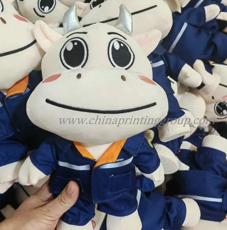 Group of custom plush animal toys in assorted colours