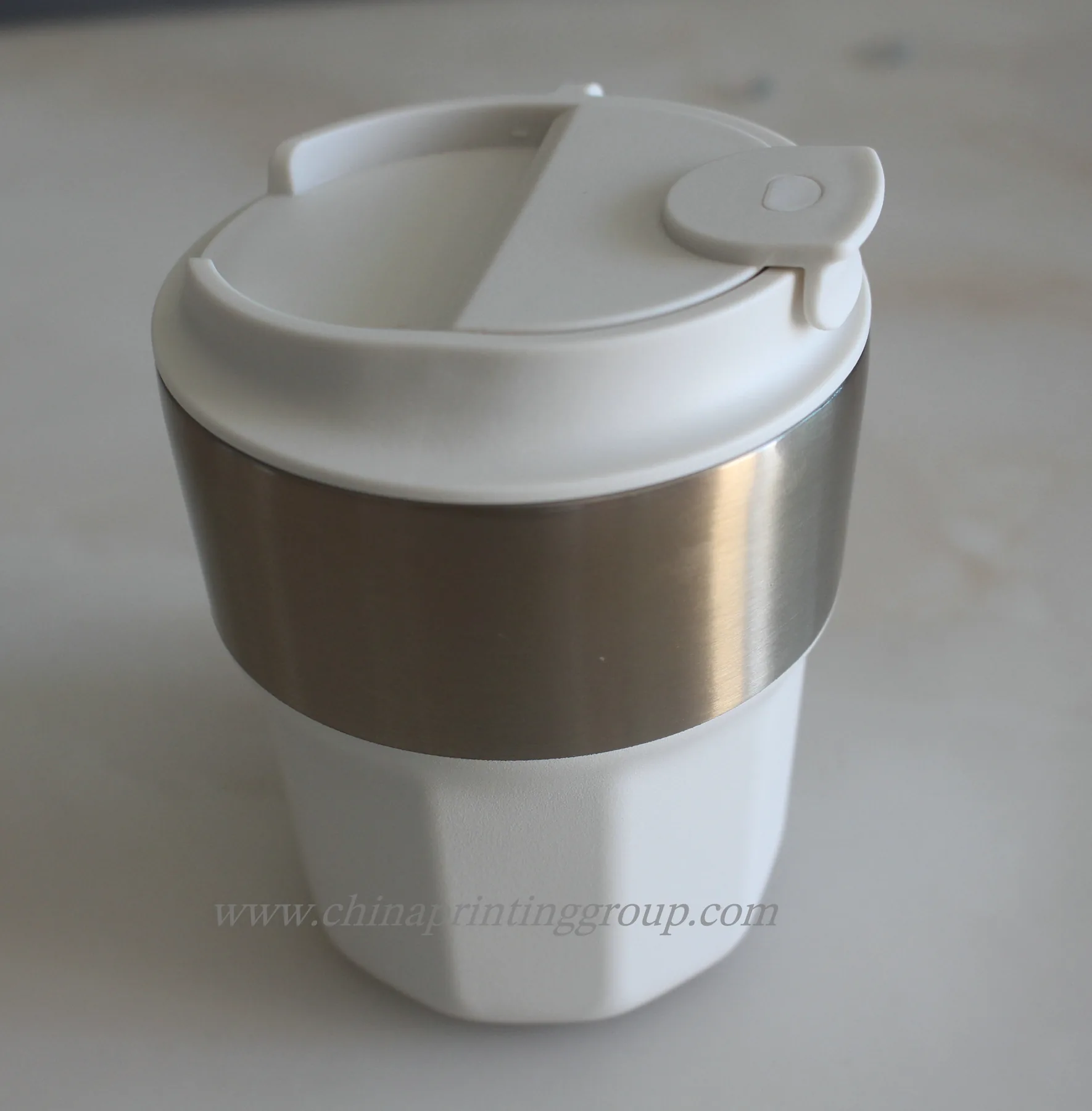 Stainless steel coffee tumbler with the lid removed