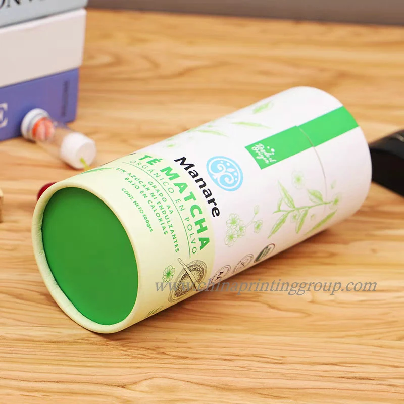 Cardboard tea tube shown open with the lid lifted