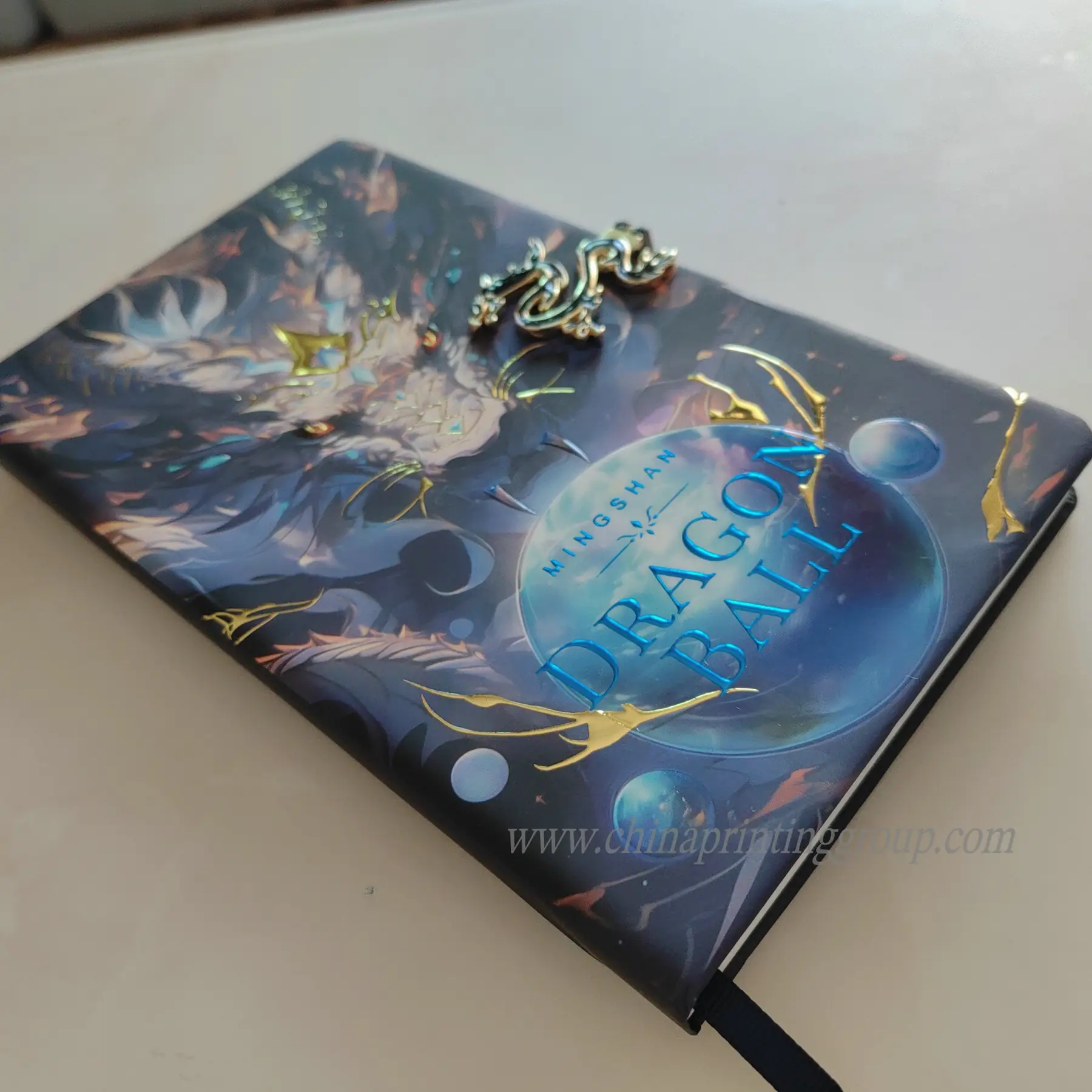 Leather journal open at the lined inner pages with ribbon marker