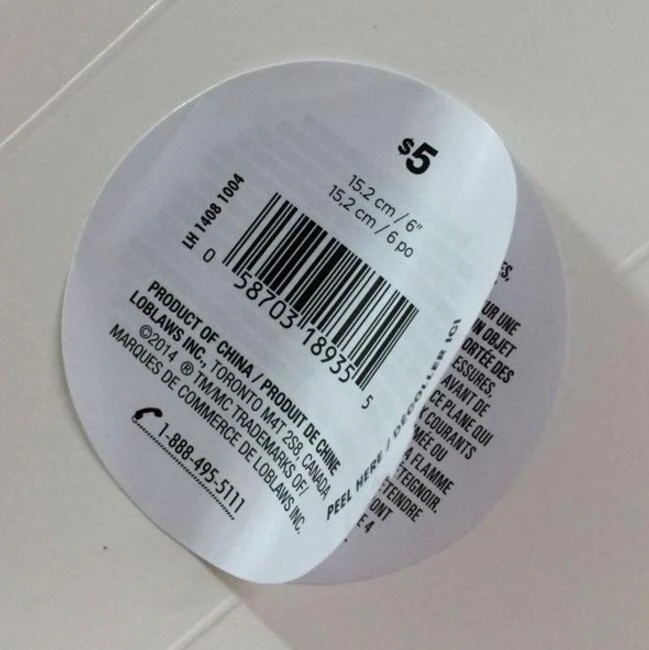 Multi-page peel off label opened to reveal inner printed pages