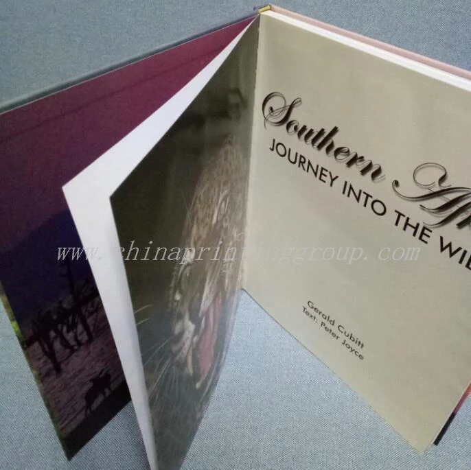 Hardback book opened flat at 180 degrees across a printed spread